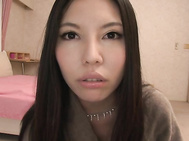 Hot Asian milf throats cock in a hotel room.