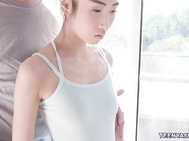 Tiny Asian teen ballerina Eva Yi got her pussy stretched by her horny trainers cock.