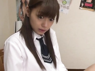 This naughty Asian schoolgirl, Konno Hikaru is playing with her magazines after school when she gets horny and stops to finger her pussy.
