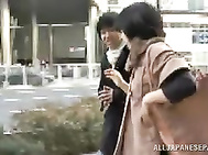 Amazing Japanese gives oral in the car outside.